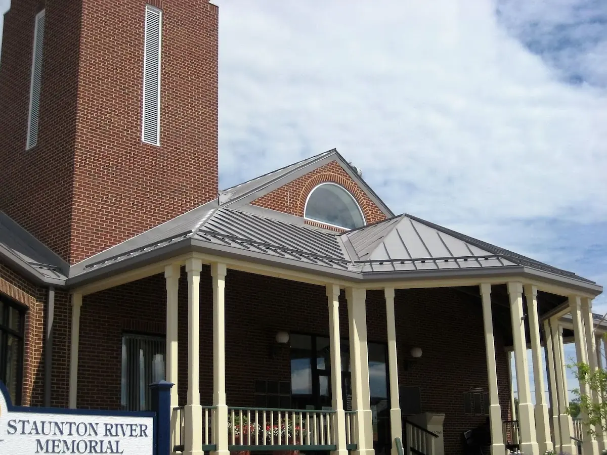 Skilled roofing craftsmen working on a residential roof in Hagerville